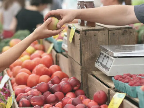 an-apple-being-purchased